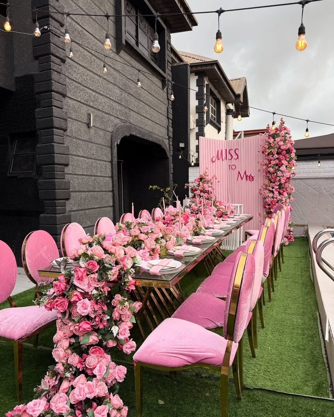 Premier Events & Decor bridal shower styling with pink florals and long table